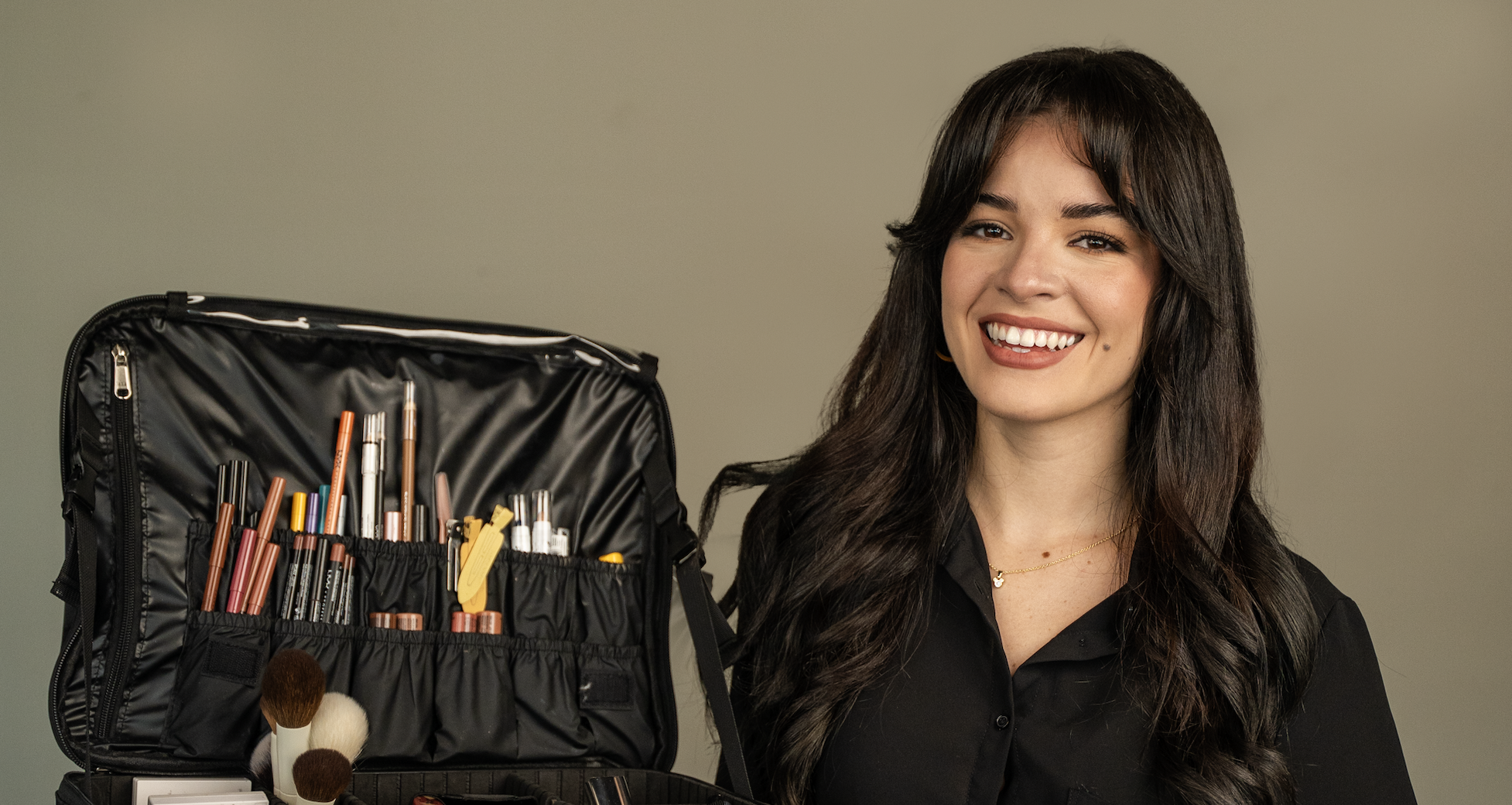 Professional makeup artist working with a client